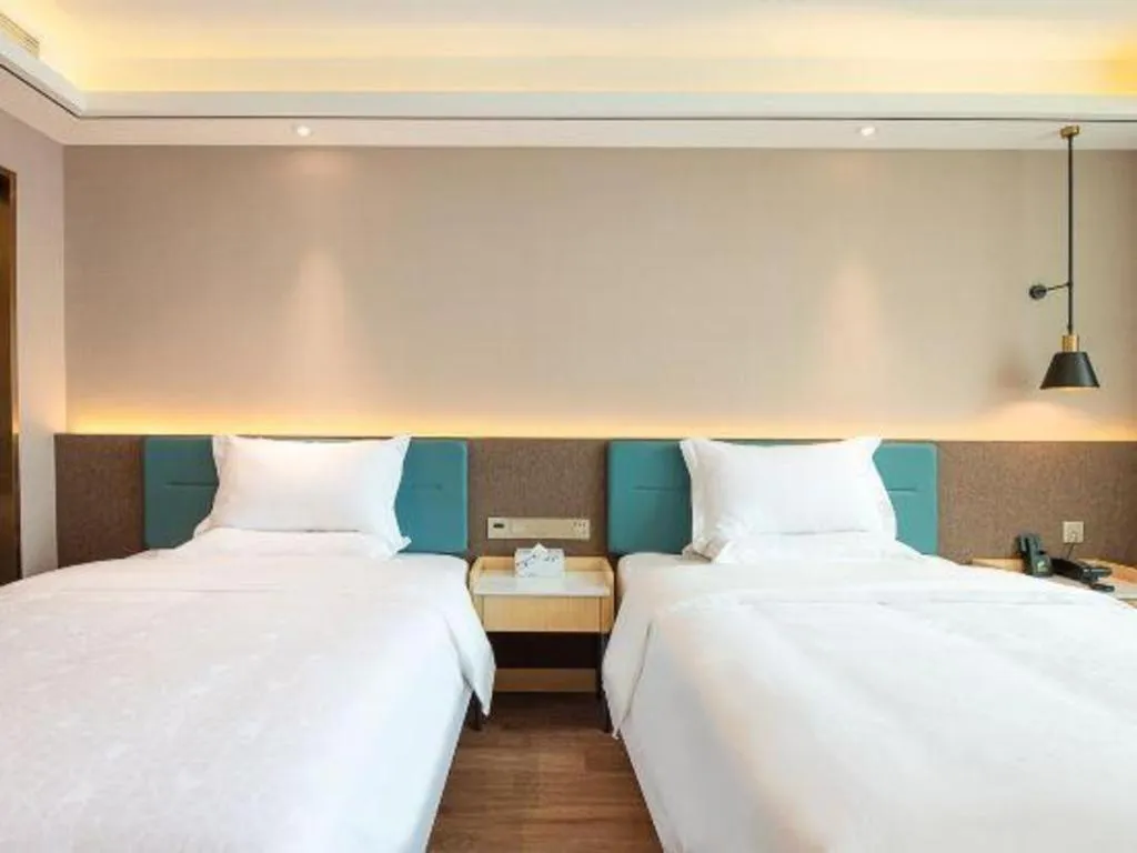 Bed in Zmax Hotel Guangzhou Railway Station