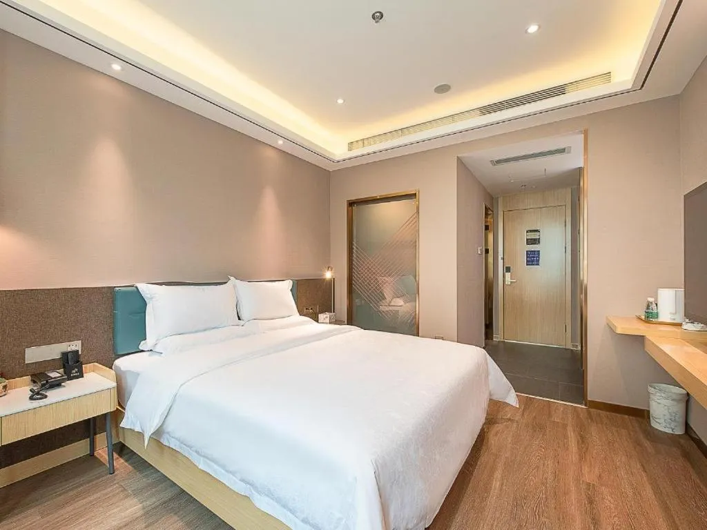 Bed in Zmax Hotel Guangzhou Railway Station