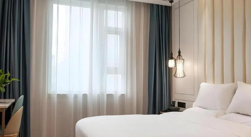 Bed in Zmax Hotel Guangzhou Railway Station