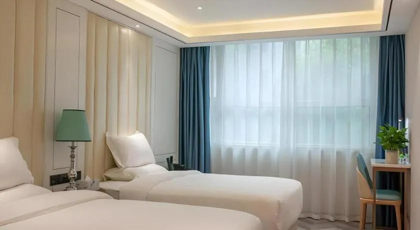 Bed in Zmax Hotel Guangzhou Railway Station