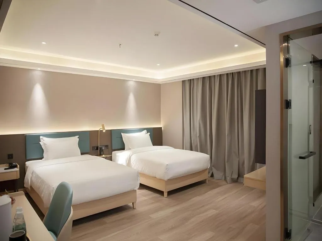 Bed in Zmax Hotel Guangzhou Railway Station