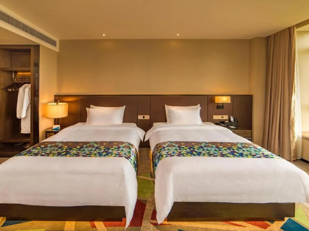 Bed in Zmax Hotel Guangzhou Railway Station