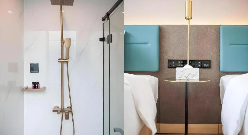 Bed in Zmax Hotel Guangzhou Railway Station