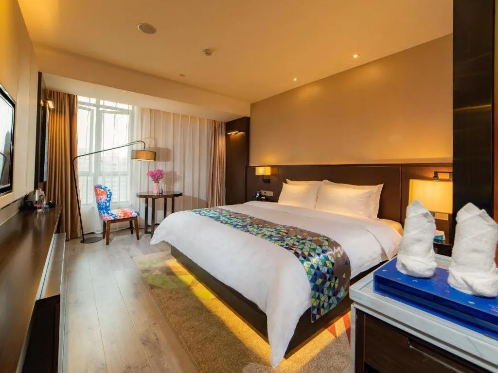 Bed in Zmax Hotel Guangzhou Railway Station