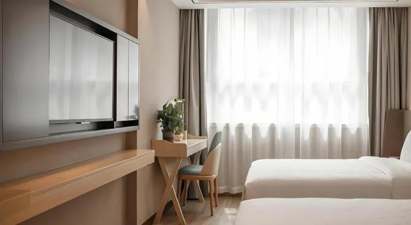 Bed in Zmax Hotel Guangzhou Railway Station