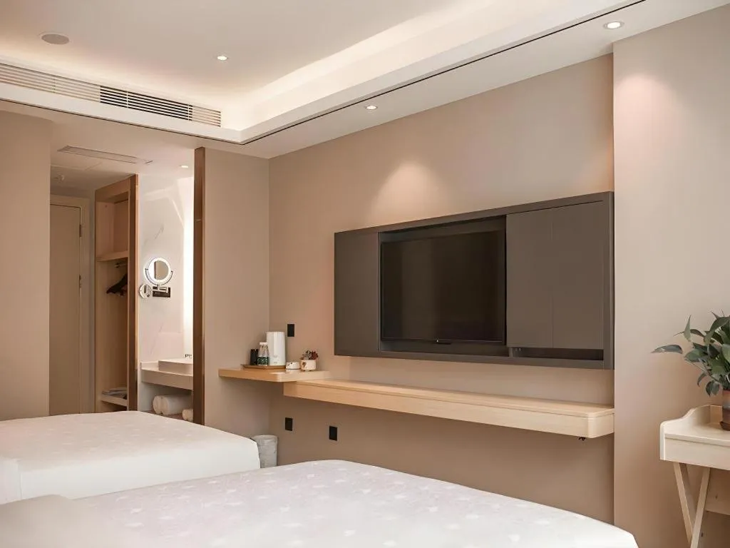 Bed in Zmax Hotel Guangzhou Railway Station