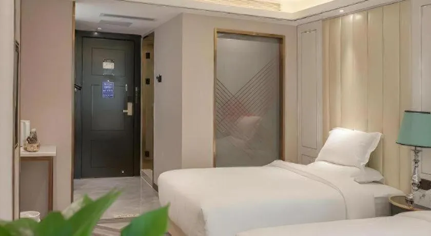Bed in Zmax Hotel Guangzhou Railway Station