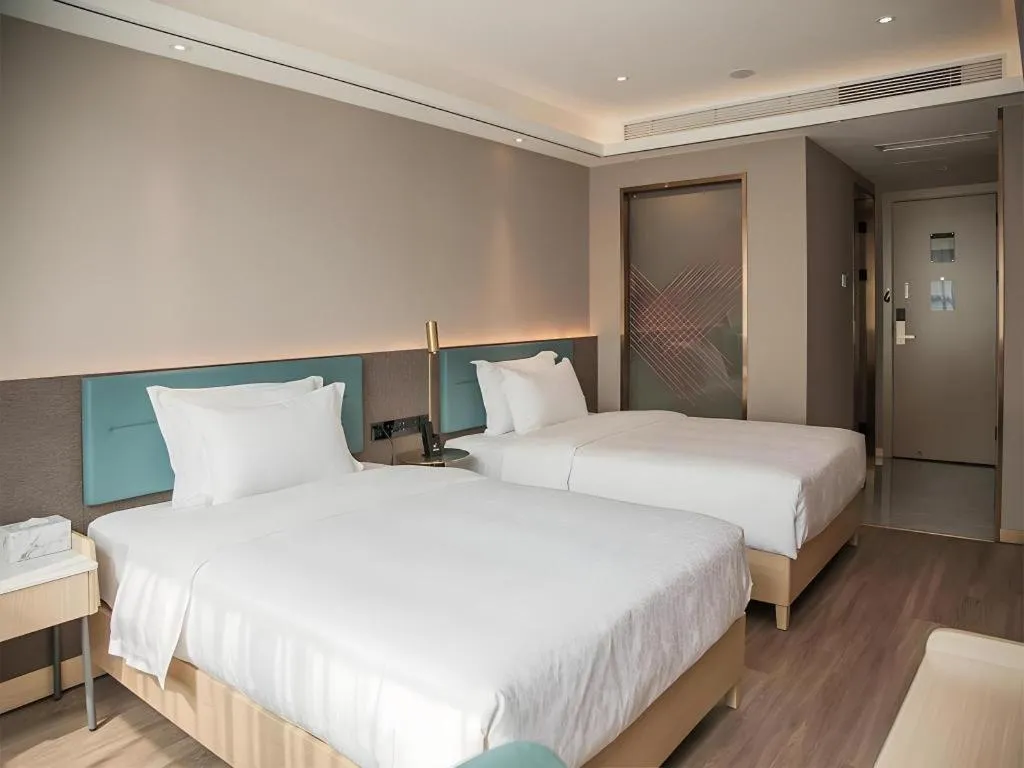 Bed in Zmax Hotel Guangzhou Railway Station