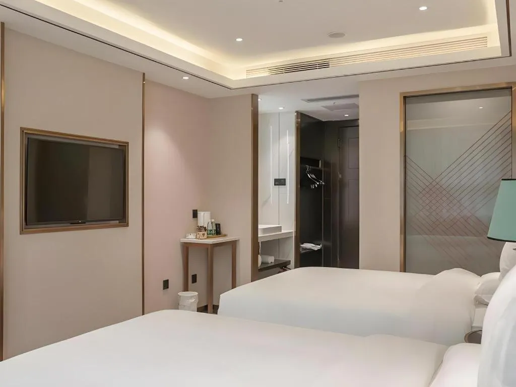 Bed in Zmax Hotel Guangzhou Railway Station