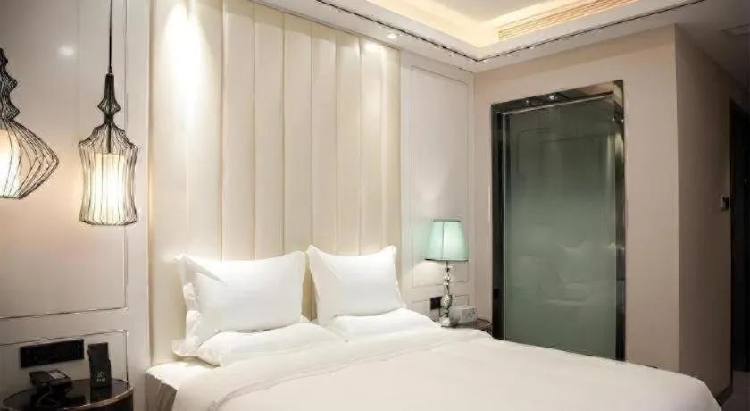 Bed in Zmax Hotel Guangzhou Railway Station