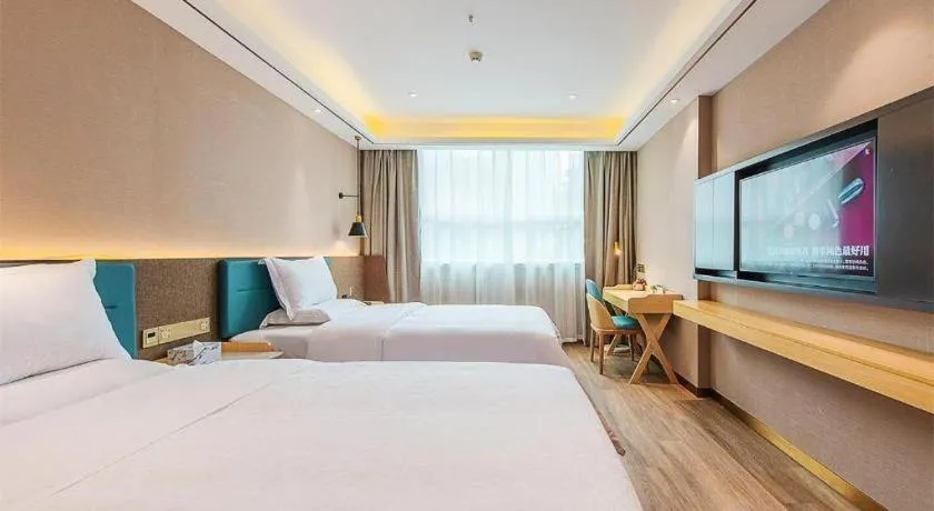 Bed in Zmax Hotel Guangzhou Railway Station