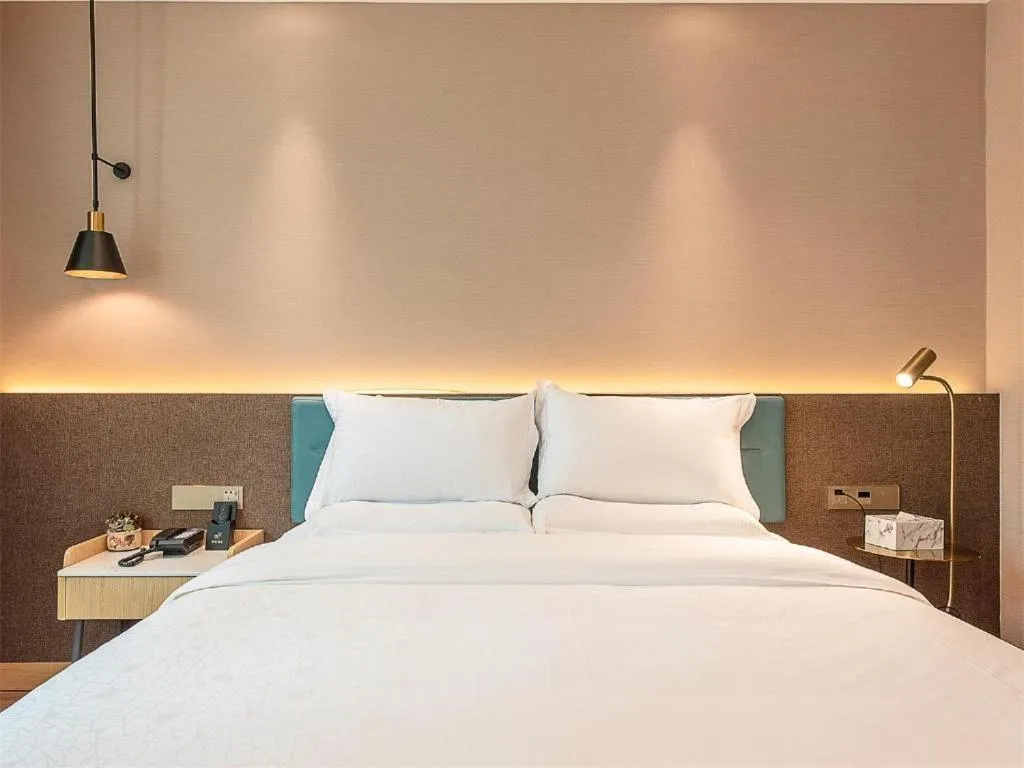 Bed in Zmax Hotel Guangzhou Railway Station