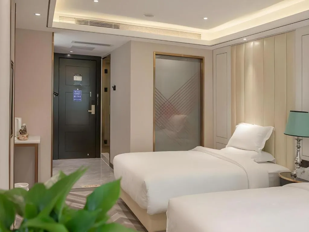 Bed in Zmax Hotel Guangzhou Railway Station