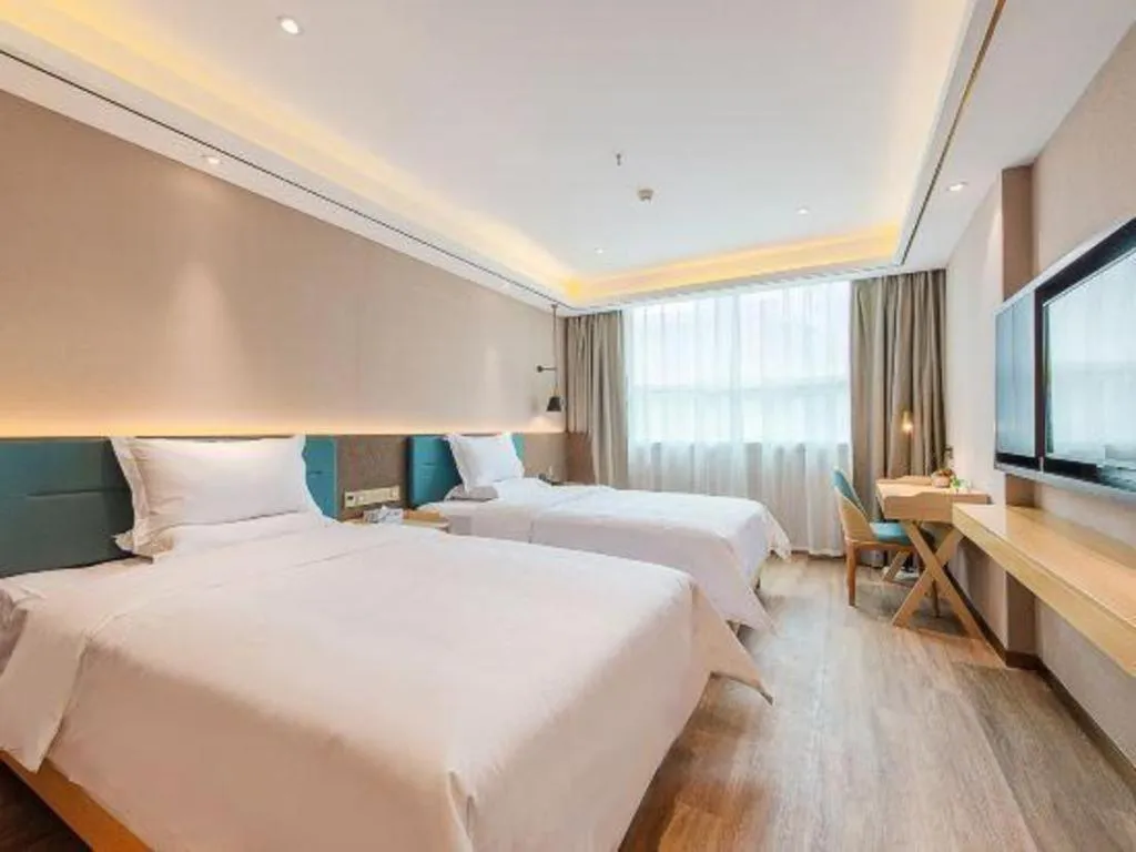 Bed in Zmax Hotel Guangzhou Railway Station