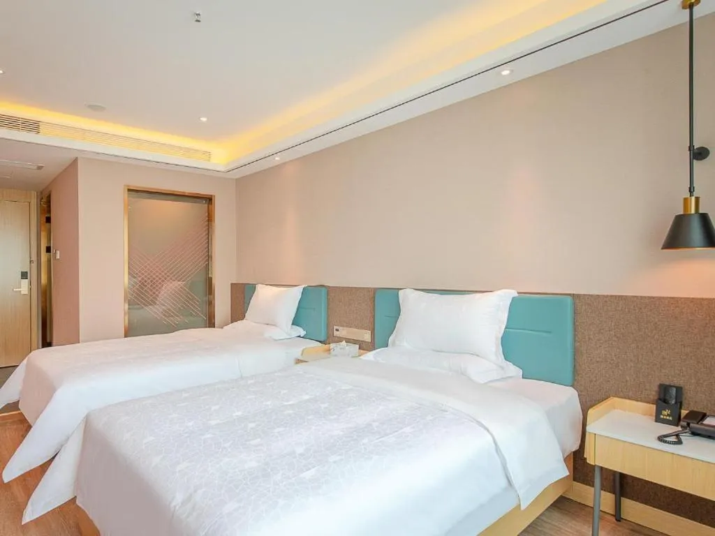 Bed in Zmax Hotel Guangzhou Railway Station