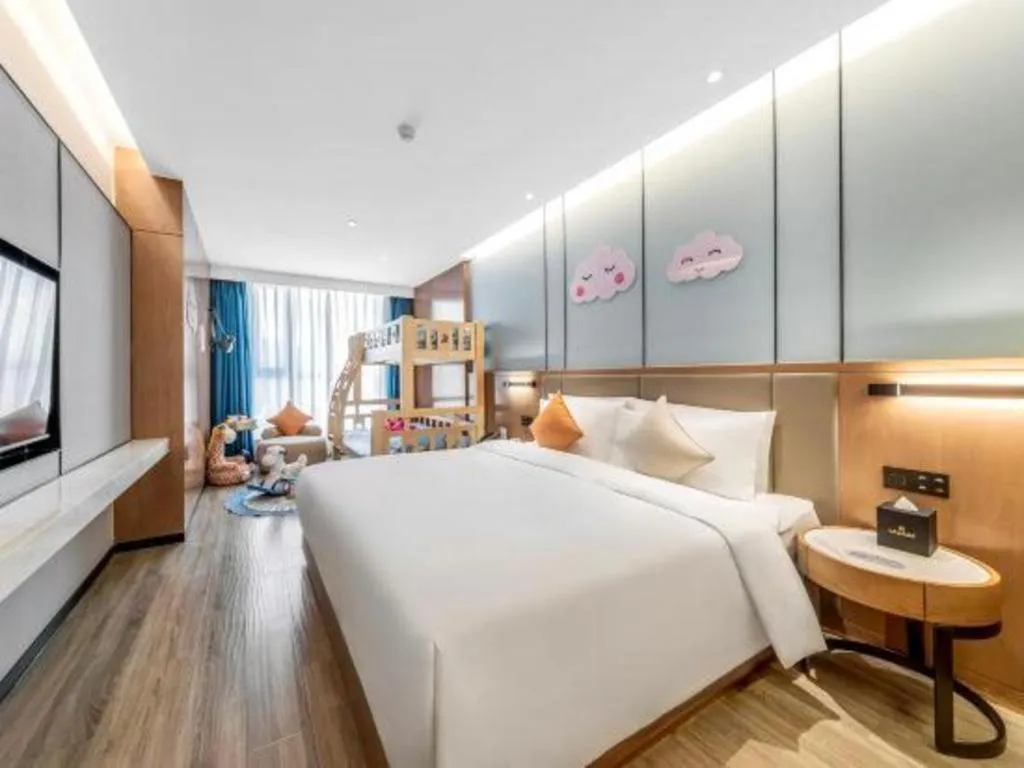 Bed in YUN-RAY Ambassador Hotel