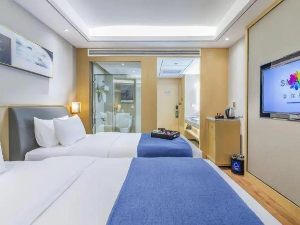 Bed in YUN-RAY Ambassador Hotel