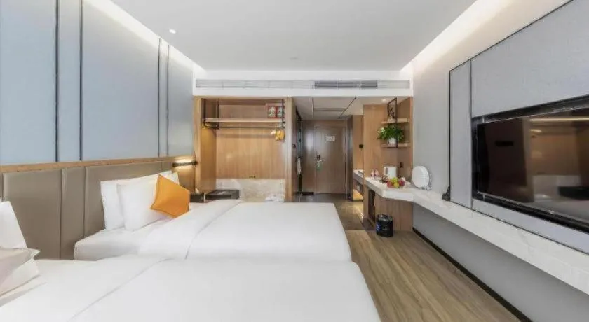 Bed in YUN-RAY Ambassador Hotel