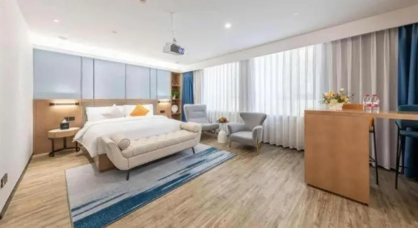 Bed in YUN-RAY Ambassador Hotel