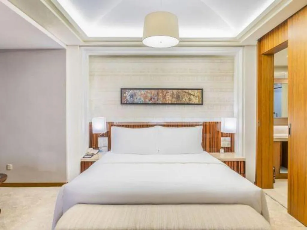 Bed in YUN-RAY Ambassador Hotel