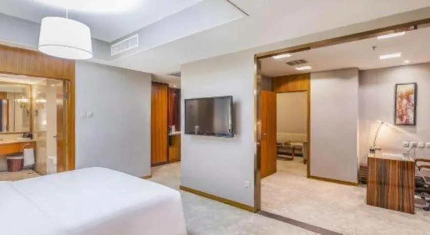 Bed in YUN-RAY Ambassador Hotel