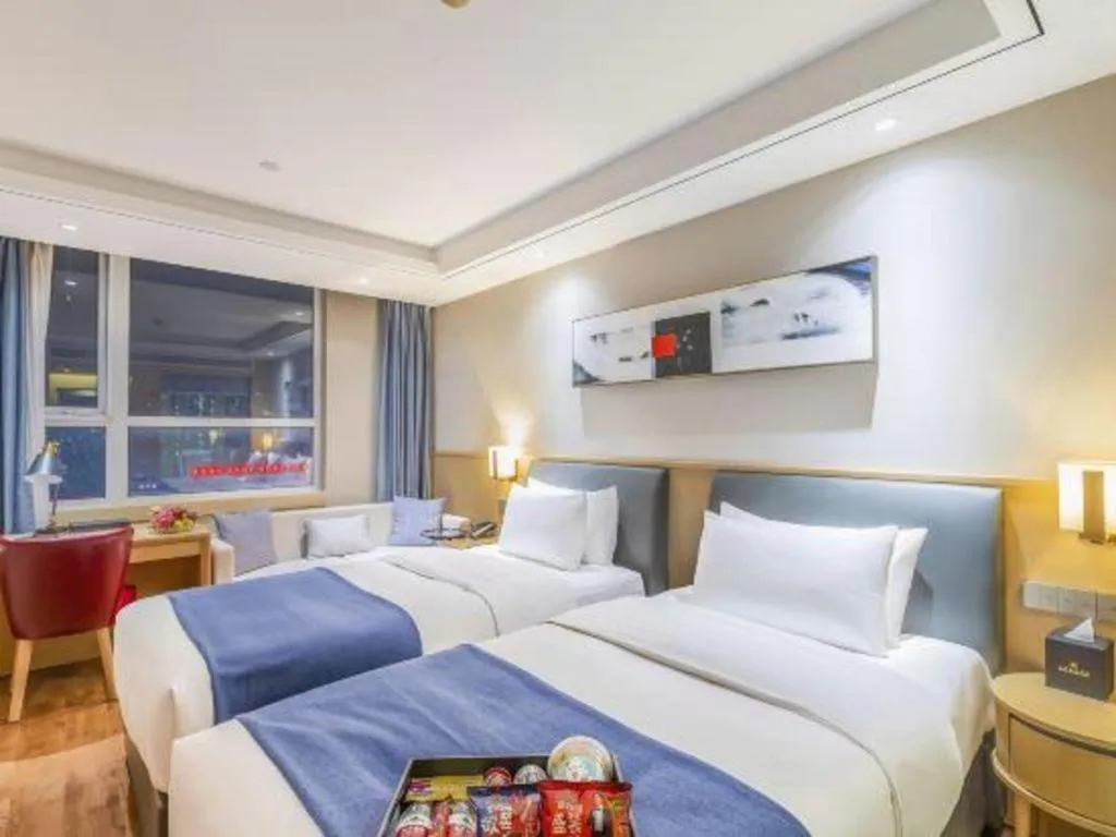 Bed in YUN-RAY Ambassador Hotel