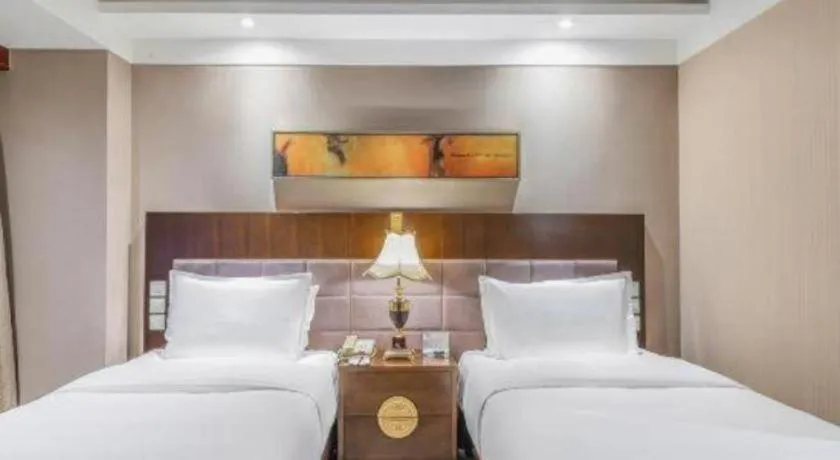 Bed in YUN-RAY Ambassador Hotel