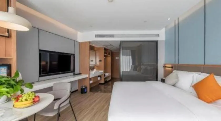 Bed in YUN-RAY Ambassador Hotel