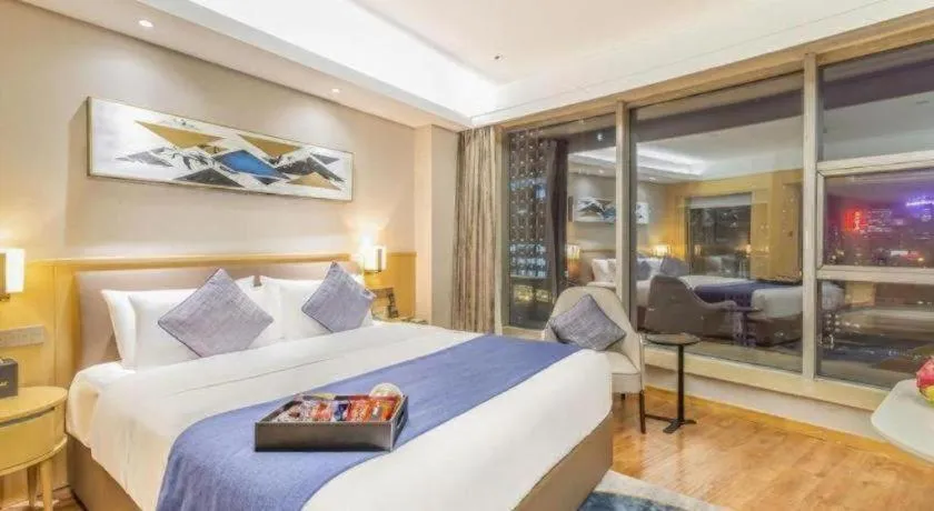 Bed in YUN-RAY Ambassador Hotel