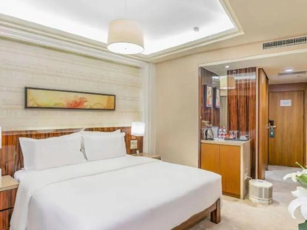 Bed in YUN-RAY Ambassador Hotel