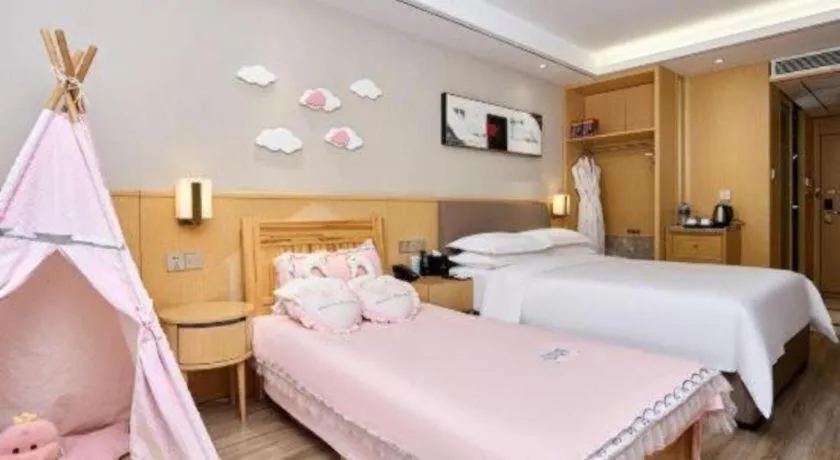 Bed in YUN-RAY Ambassador Hotel