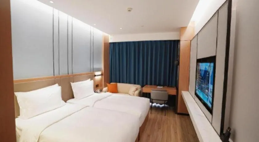 Bed in YUN-RAY Ambassador Hotel