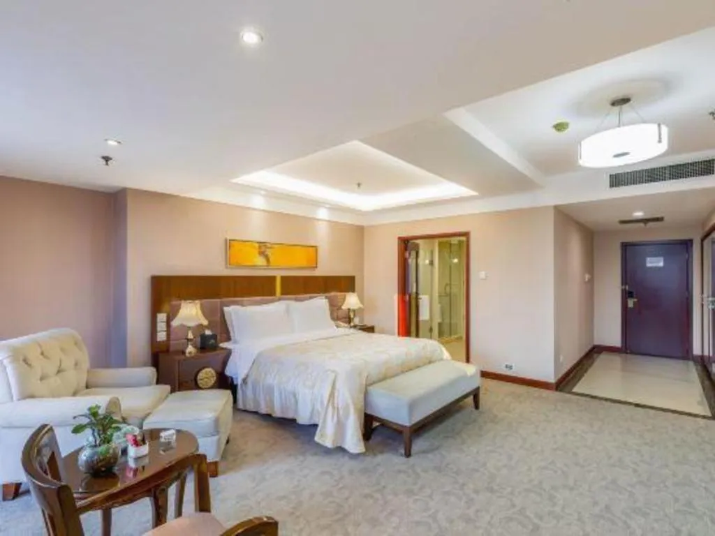 Bed in YUN-RAY Ambassador Hotel