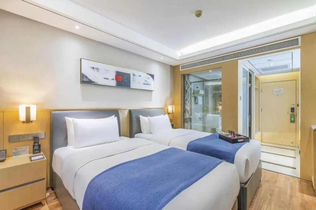 Bed in YUN-RAY Ambassador Hotel