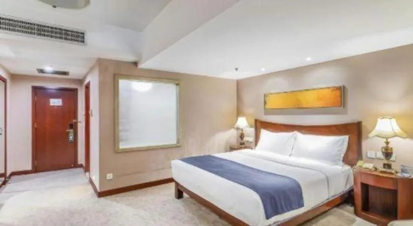 Bed in YUN-RAY Ambassador Hotel