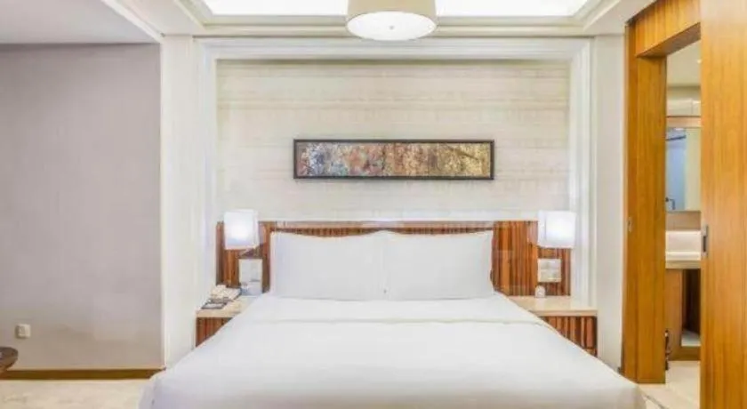 Bed in YUN-RAY Ambassador Hotel