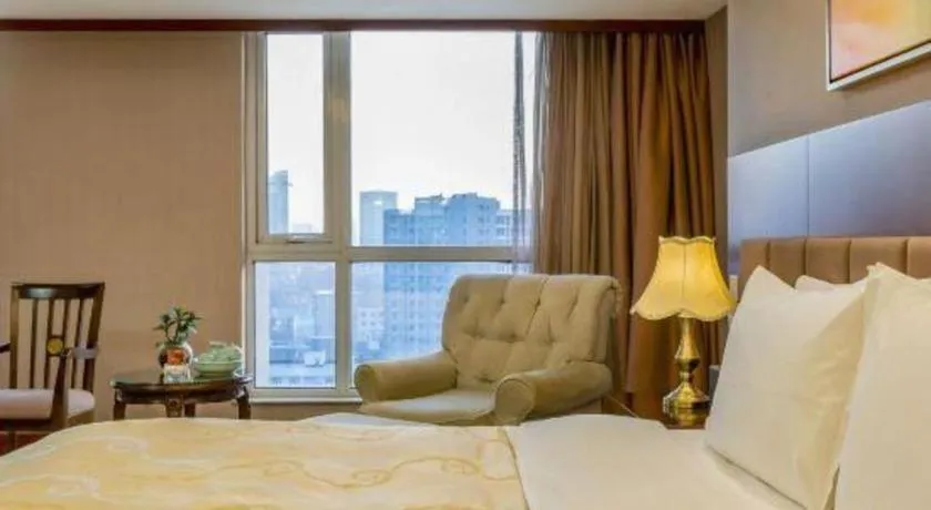 Bed in YUN-RAY Ambassador Hotel