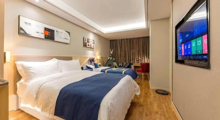 Bed in YUN-RAY Ambassador Hotel