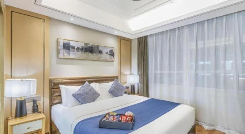 Bed in YUN-RAY Ambassador Hotel