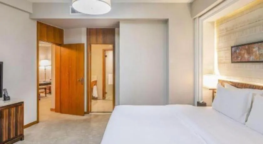 Bed in YUN-RAY Ambassador Hotel