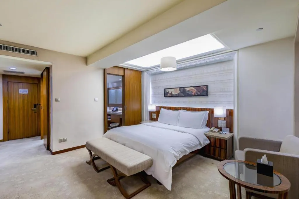 Bed in YUN-RAY Ambassador Hotel