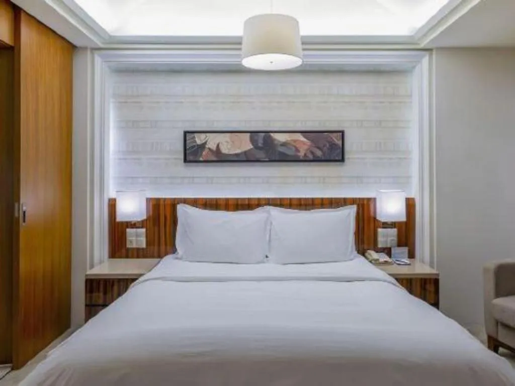 Bed in YUN-RAY Ambassador Hotel