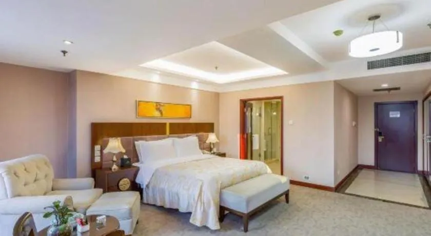 Bed in YUN-RAY Ambassador Hotel