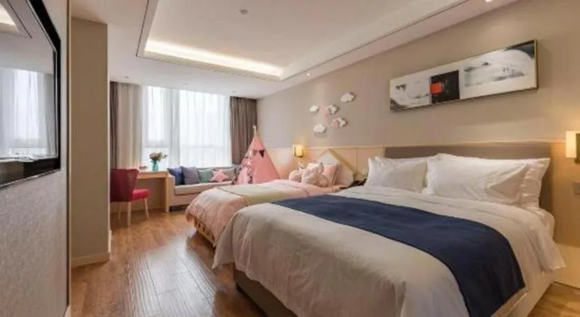 Bed in YUN-RAY Ambassador Hotel