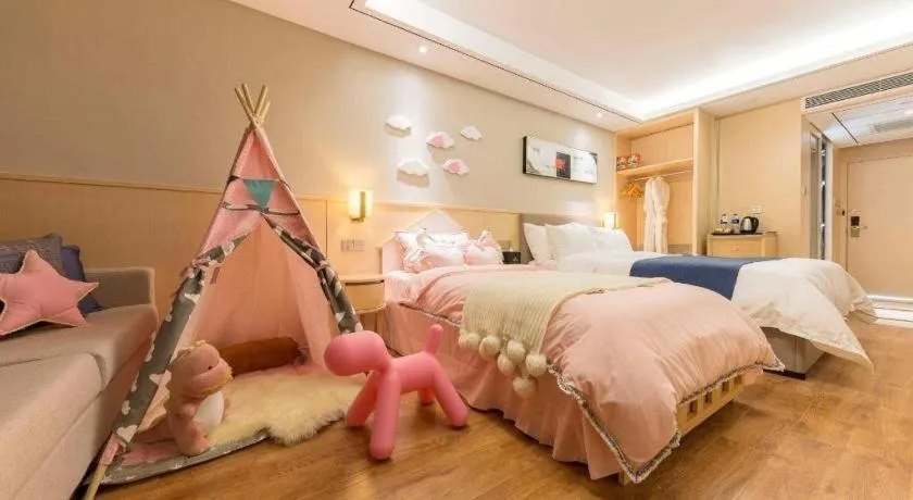 Bed in YUN-RAY Ambassador Hotel