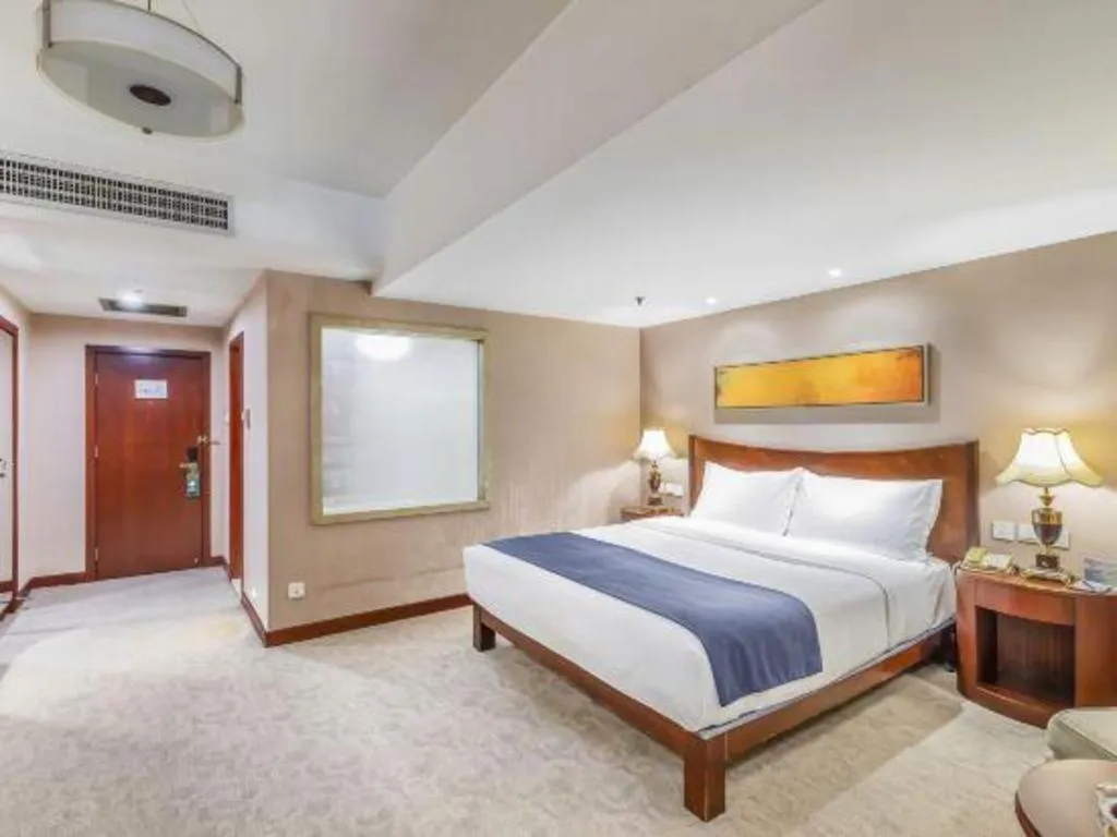 Bed in YUN-RAY Ambassador Hotel