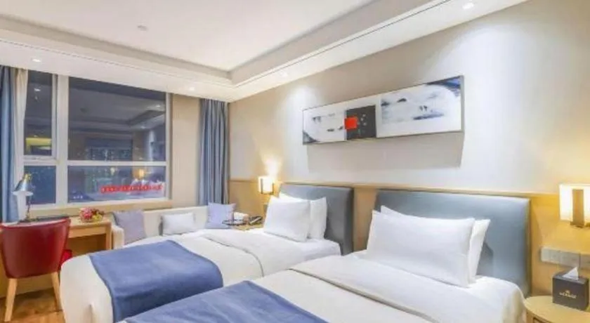 Bed in YUN-RAY Ambassador Hotel