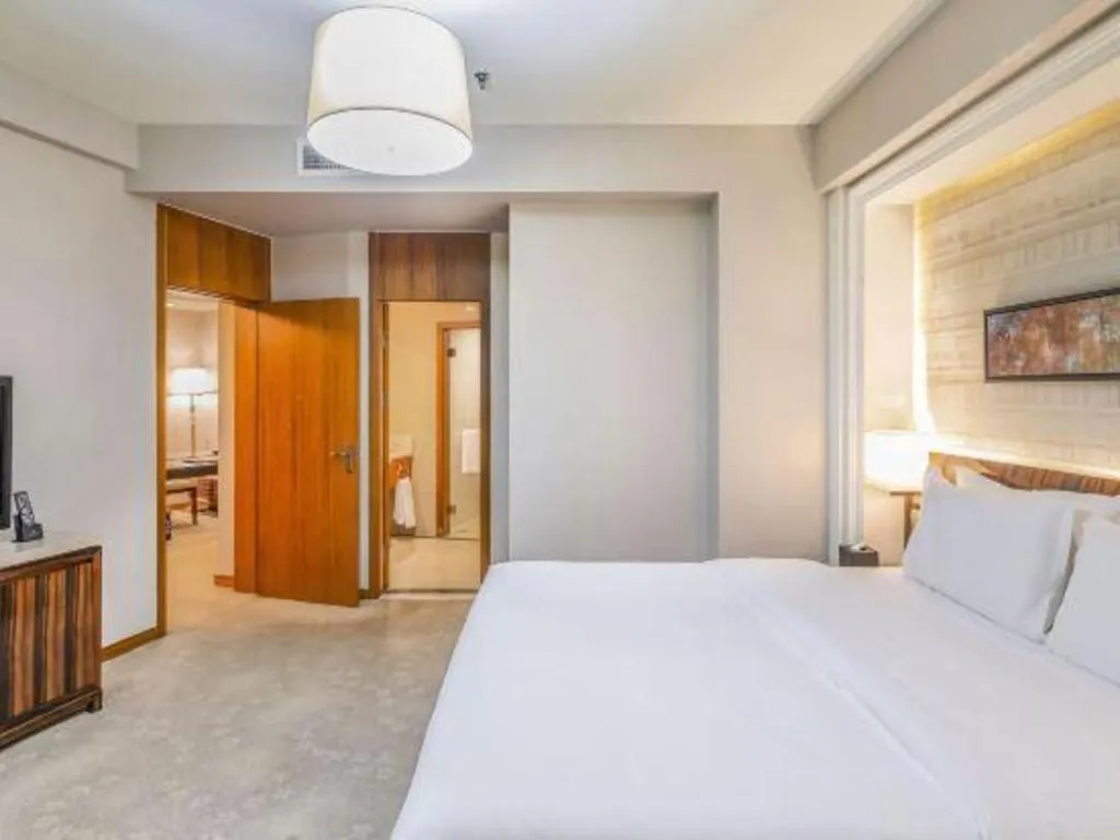 Bed in YUN-RAY Ambassador Hotel