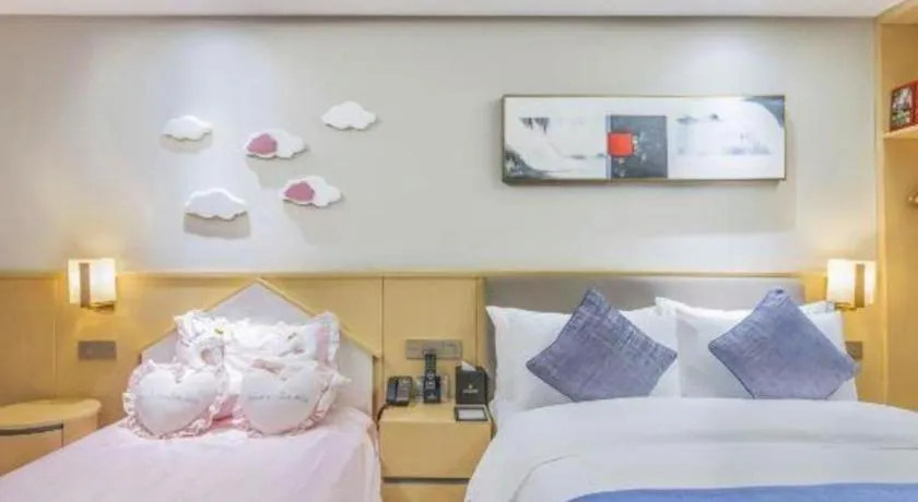 Bed in YUN-RAY Ambassador Hotel