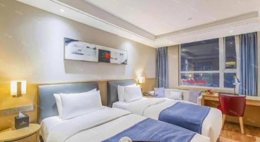 Bed in YUN-RAY Ambassador Hotel